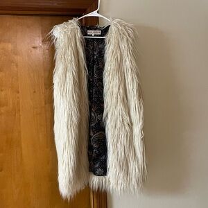 Faux fur free people long vest